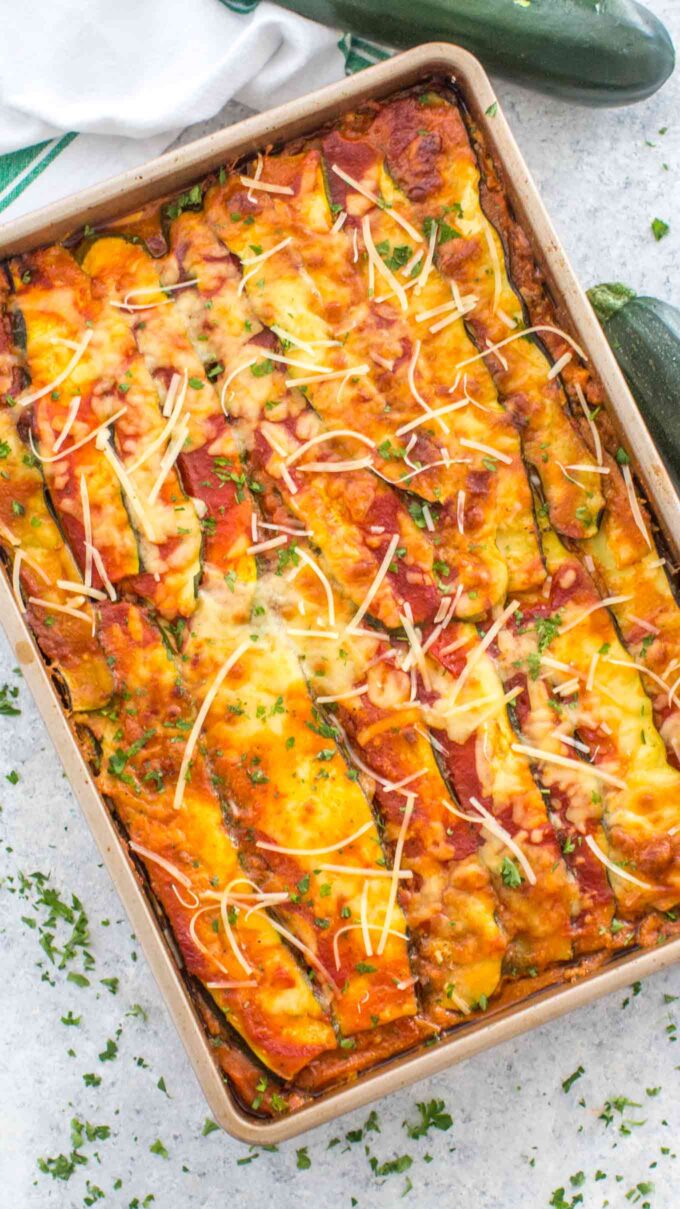 Homemade Zucchini Lasagna with marinara sauce and various cheeses in a casserole dish