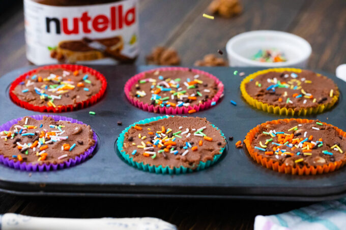 Nutella fudge topped with sprinkles.