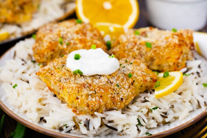 Crispy oven baked tilapia over wild rice.