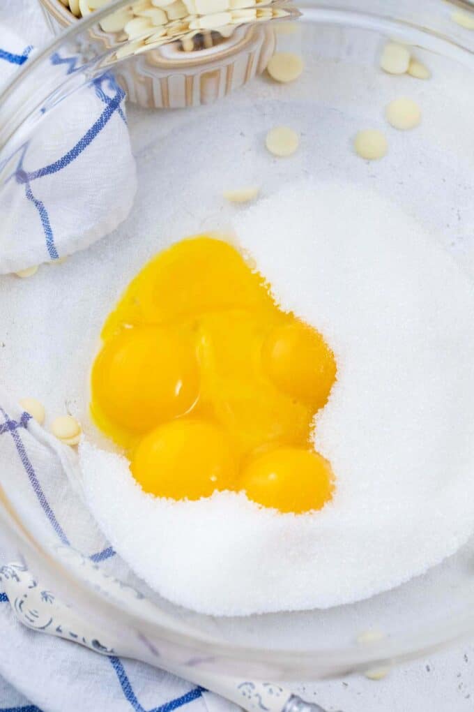 egg yolks and sugar in a bowl