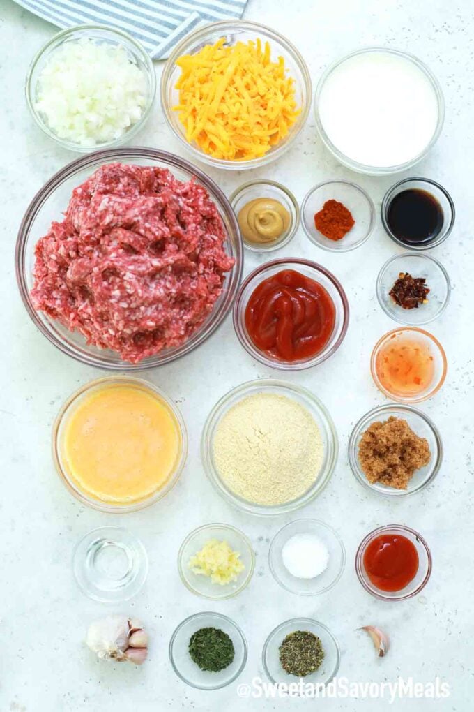 meatloaf recipe ingredients in bowls on a white table