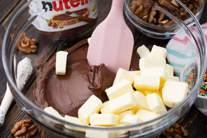 Nutella and butter in a bowl.
