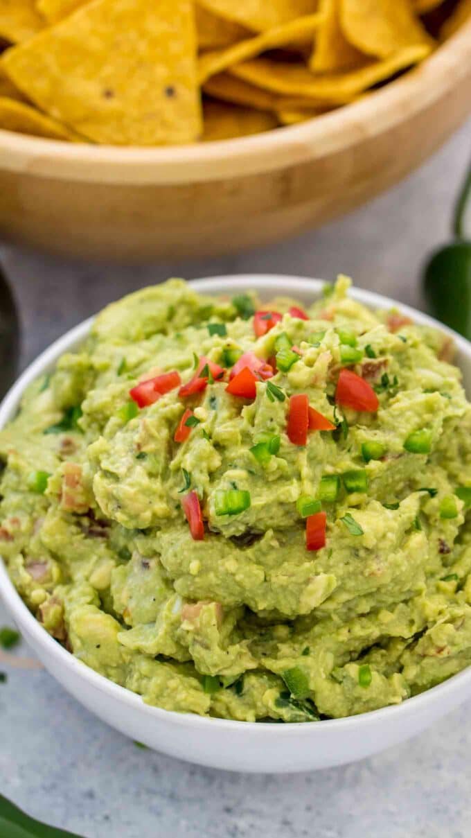 Homemade Guacamole topped with chopped tomatoes