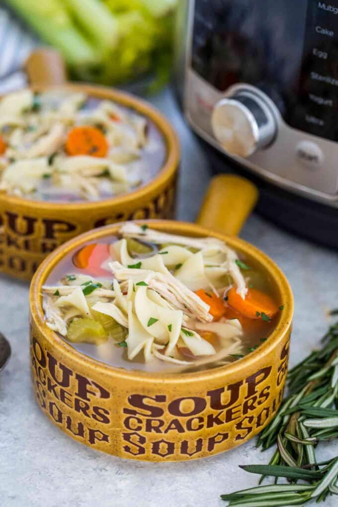 two bowls of chicken noodle soup