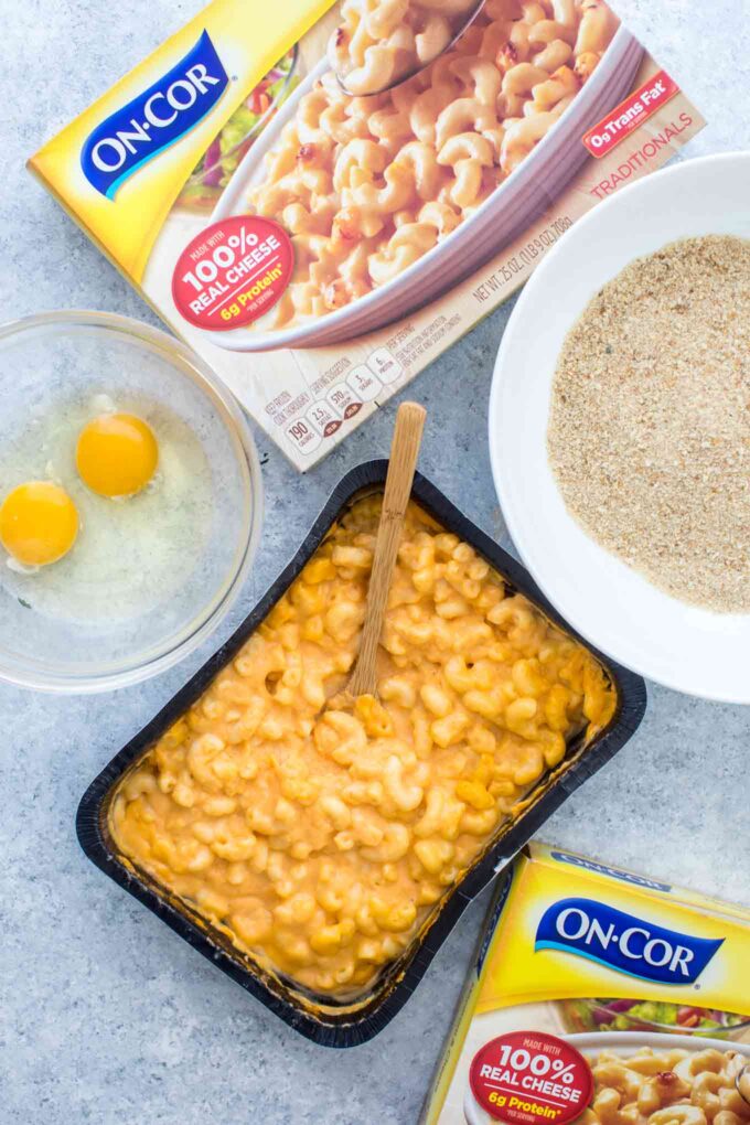 Mac and cheese balls ingredients on a table.