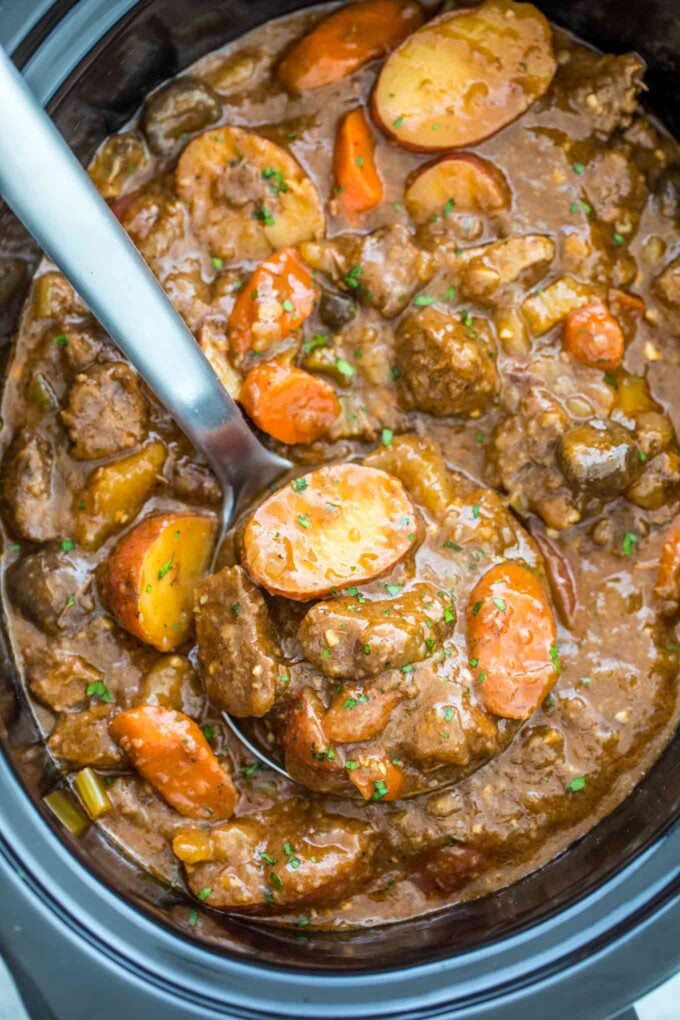 Slow cooker beef stew with potato and veggies in a rich beef broth