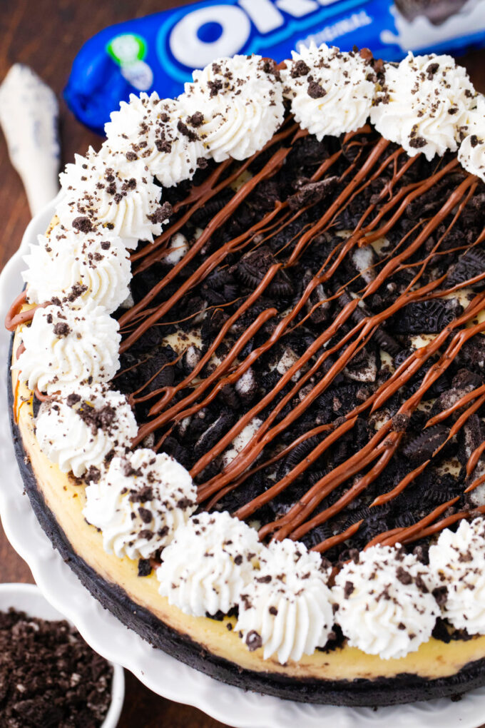 Overhead shot of Oreo cheesecake topped with crushed Oreos.