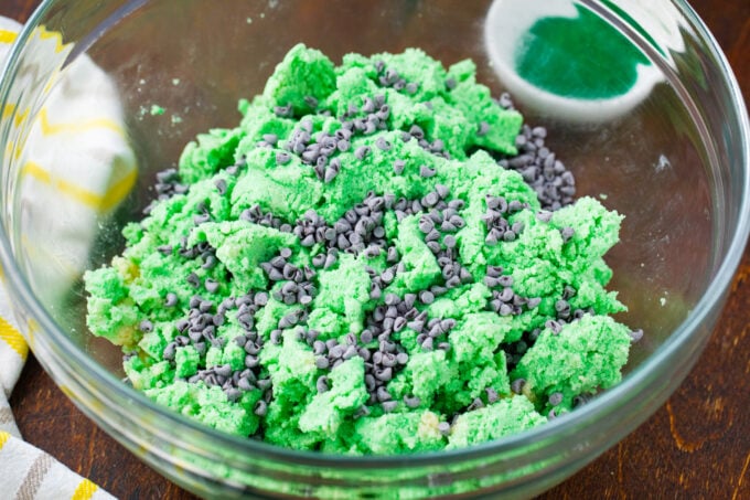 Adding mini chocolate chips to mint truffle batter.