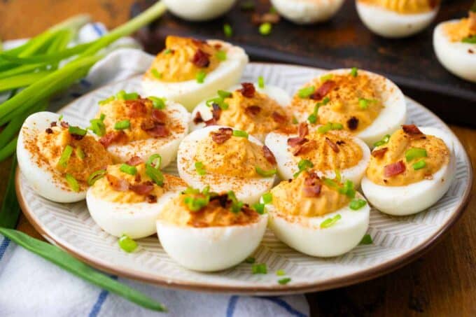 deviled eggs on a serving plate