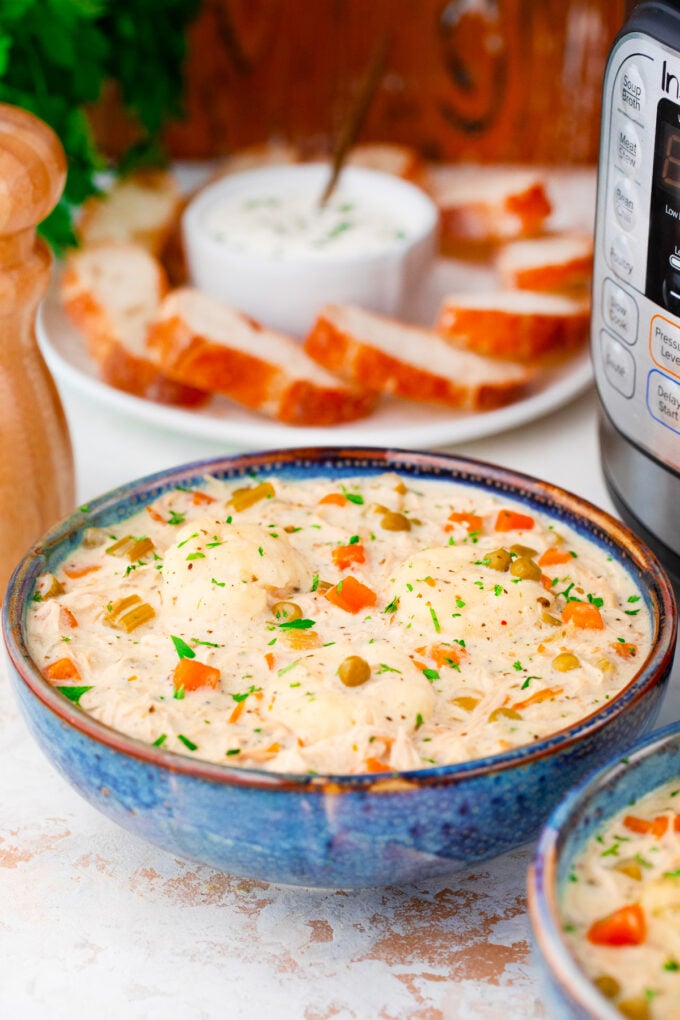 A bowl of creamy Instant Pot chicken and dumplings.