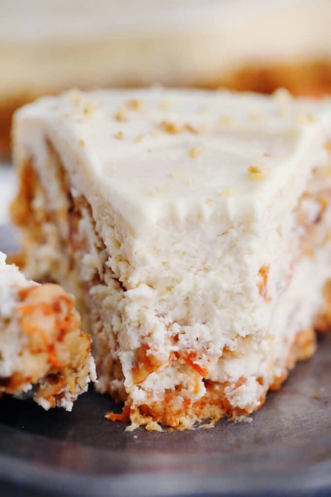 A slice of homemade carrot cake cheesecake