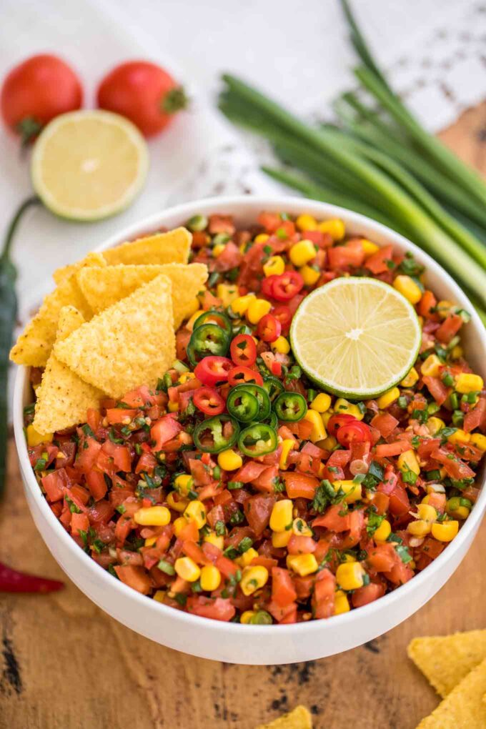 bowl with Pico de Gallo on a wooden table