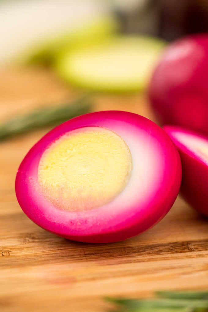 Pickled eggs with garlic and beets cut in half