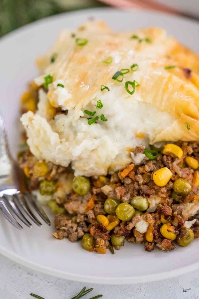 Sliced easy shepherd's pie on a white plate