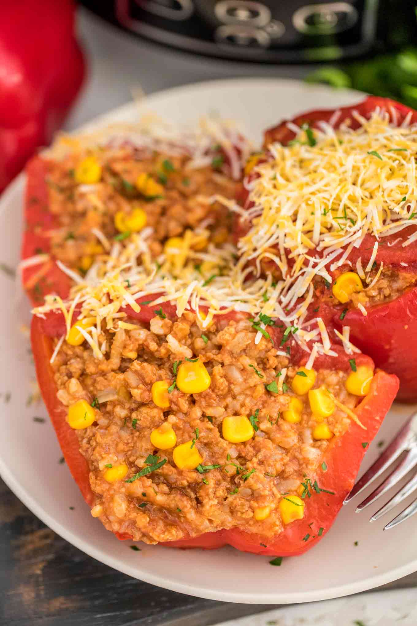 Slow Cooker Mexican Stuffed Peppers - Sweet and Savory Meals