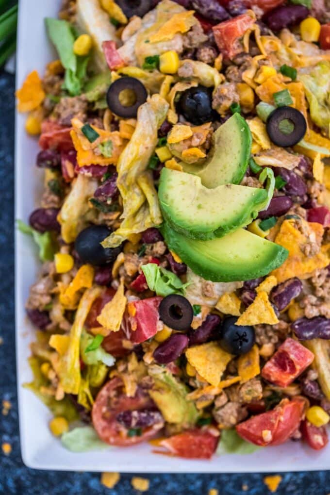 Homemade taco salad on a white plate.