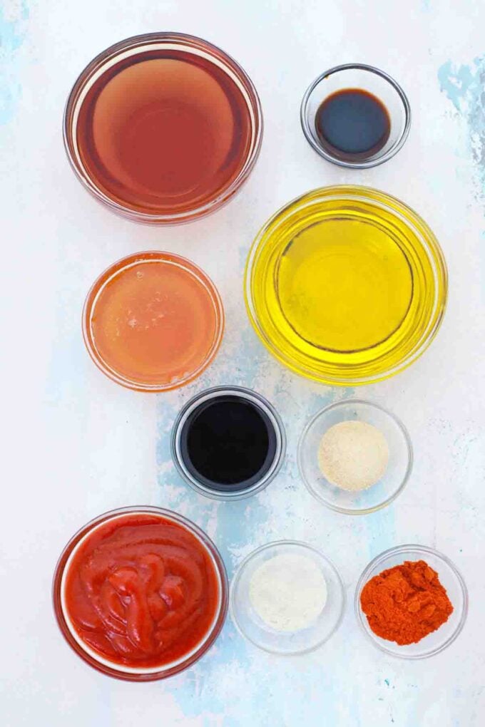 sauces and spices in bowls on a table