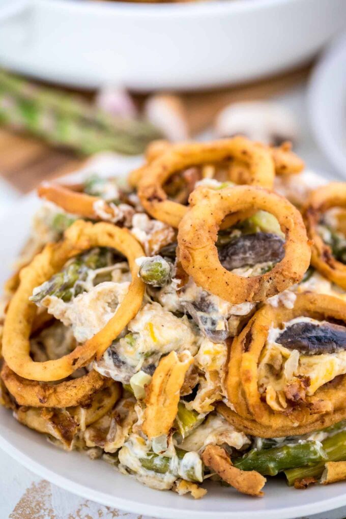 Creamy asparagus casserole on a white plate