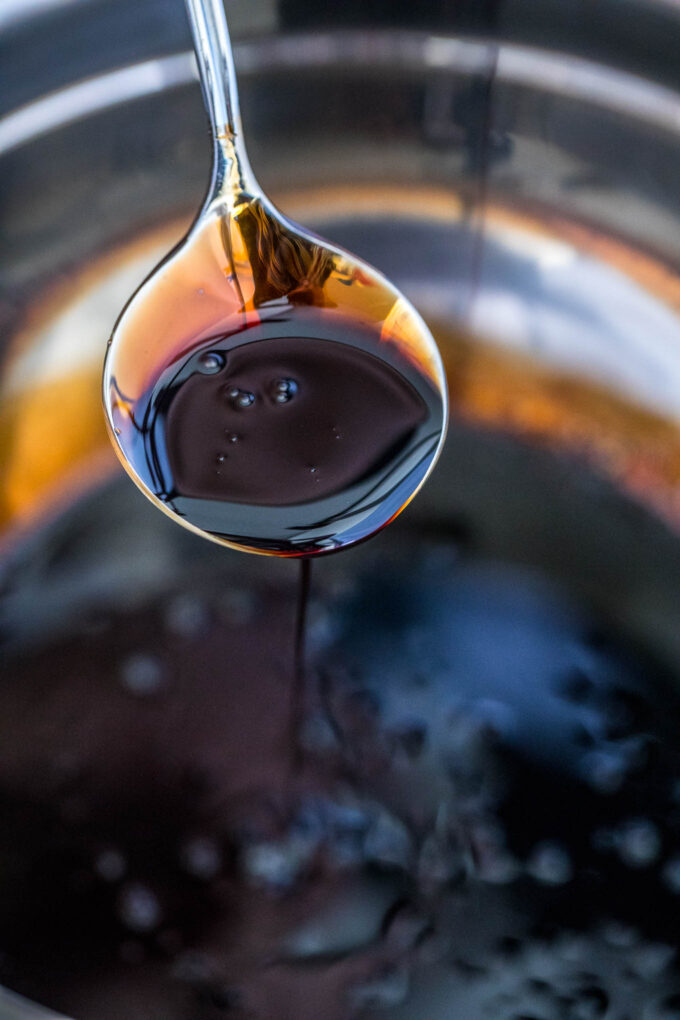 a spoon of homemade balsamic glaze