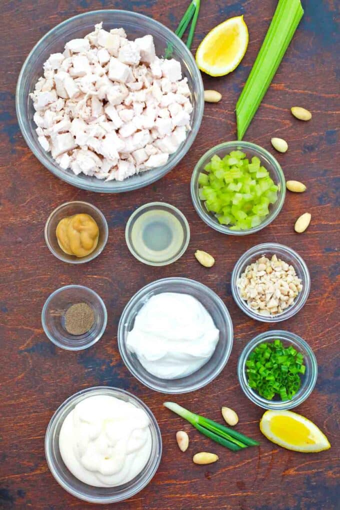 overhead shot of a bowls with chicken celery mayo almond mustard
