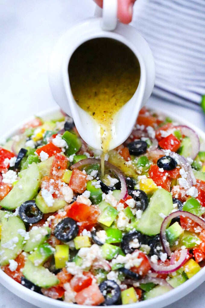 Picture of Greek Salad with Greek Salad dressing.