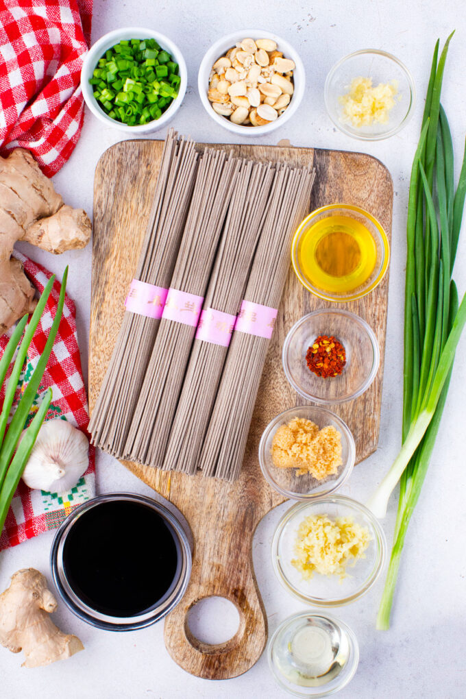Overhead shot of Soba noodles ingredients arranged on a table.
