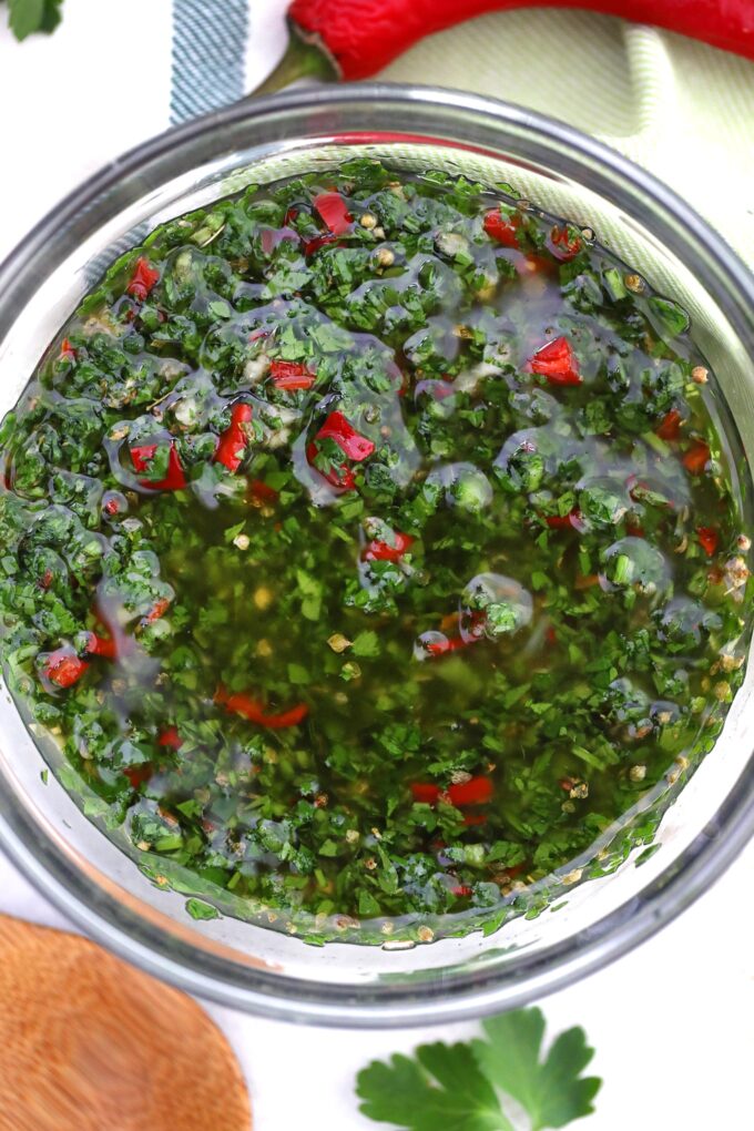 overhead shot of a bowl of chimichurri sauce