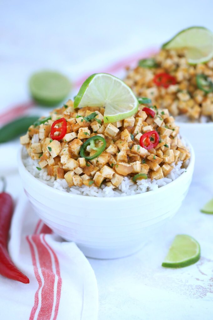 chipotle Sofritas bowls with lime on a white table