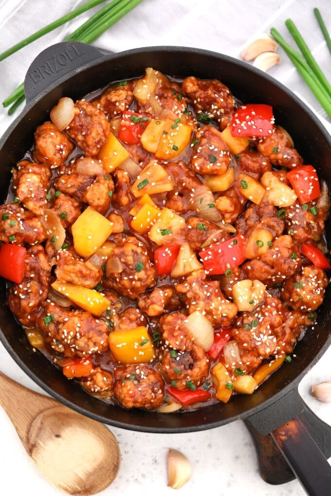 overhead shot of Sweet and Sour Pork in a cast iron skillet