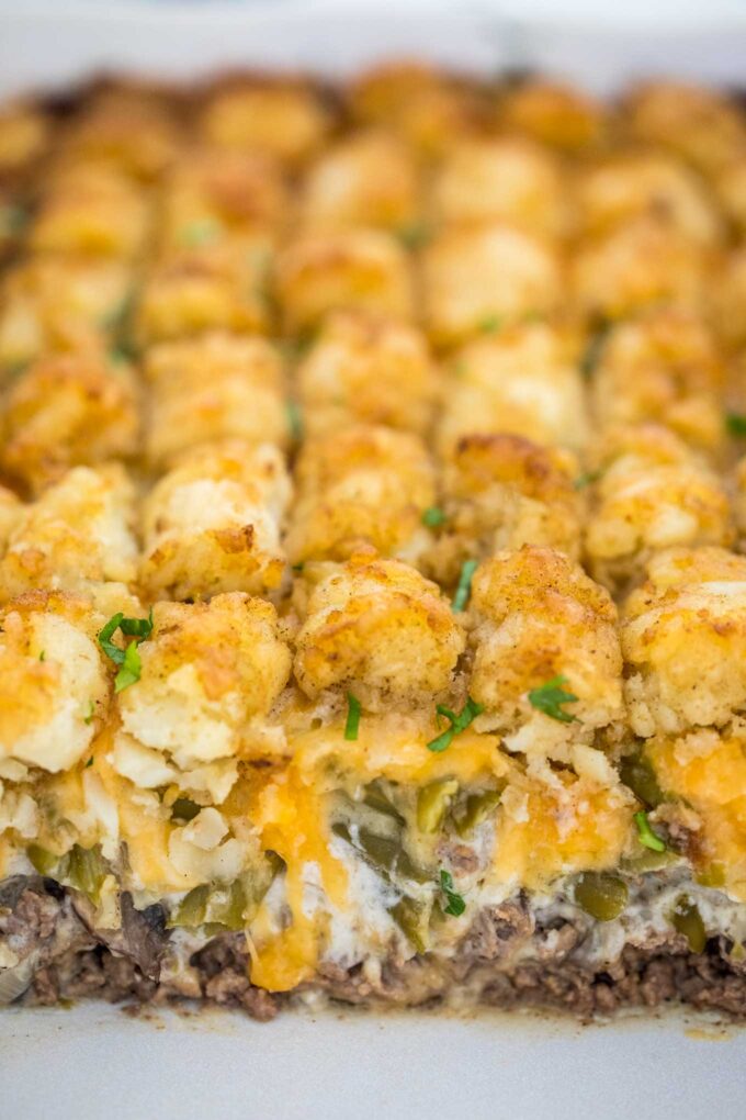 Homemade tater tot casserole with ground beef and cheese.