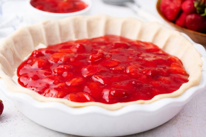 Strawberry pie filling in the pie crust.
