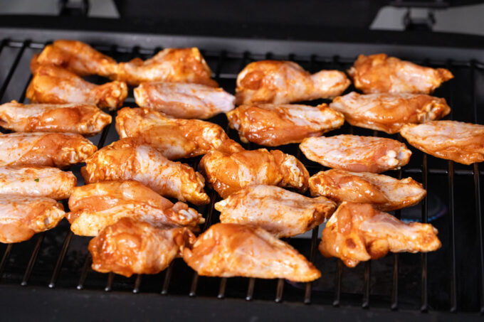 Grilling chicken wings.