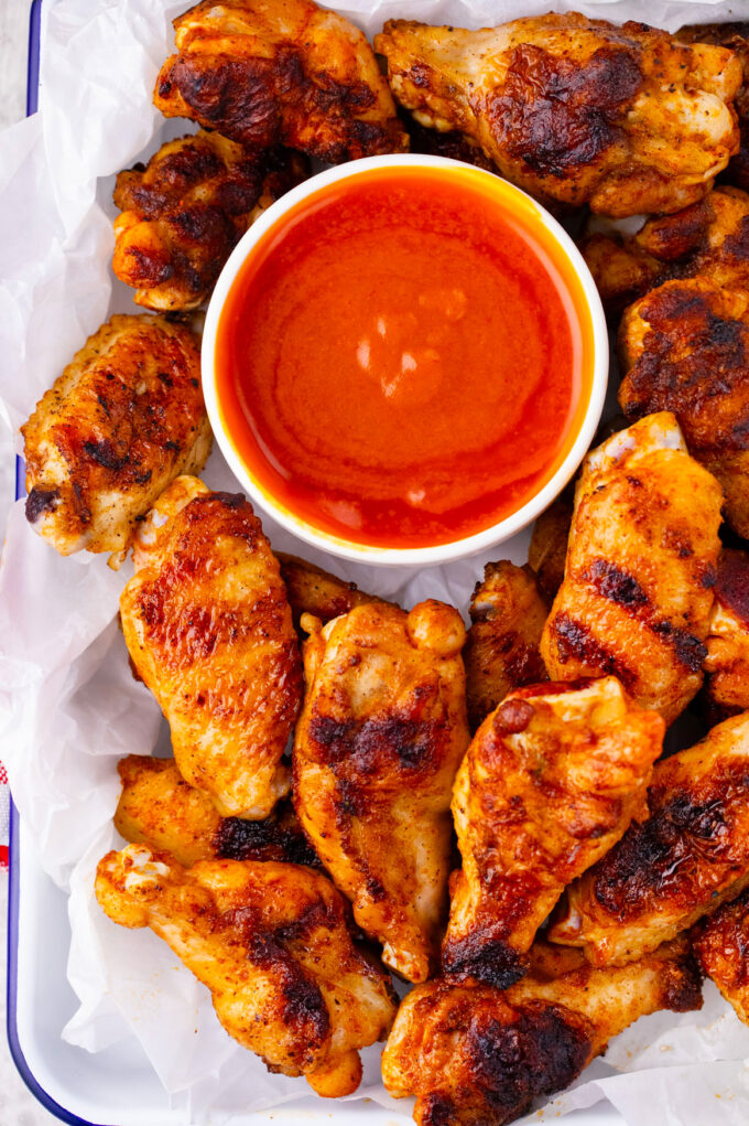 Crisp and charred grilled chicken wings.