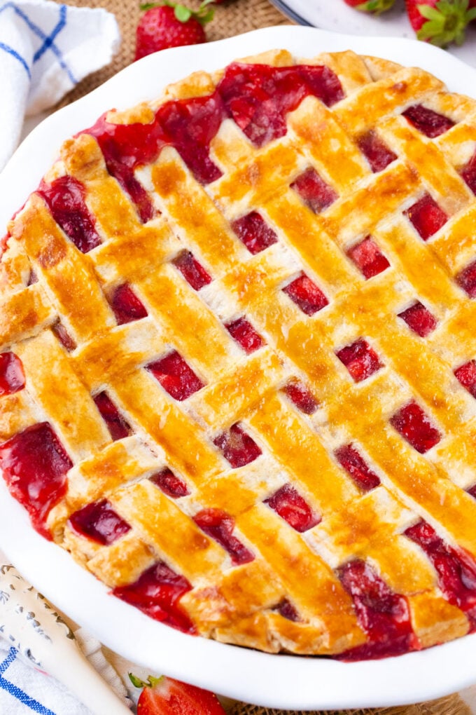 Overhead shot of strawberry pie with lattice top.