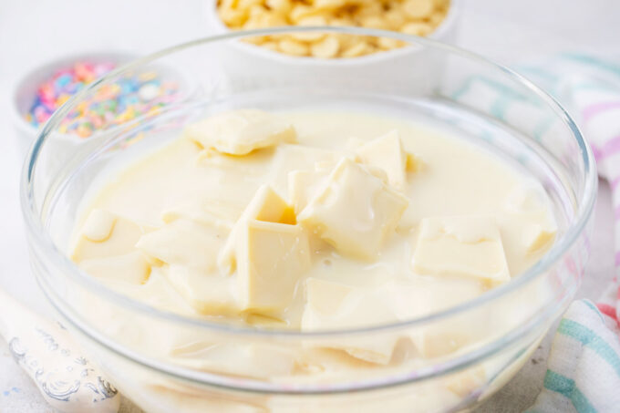 White chocolate and condensed milk in a bowl.