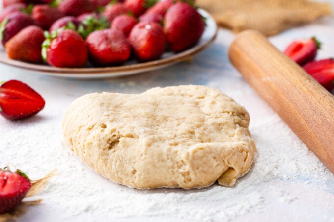 Pie dough on a working surface.