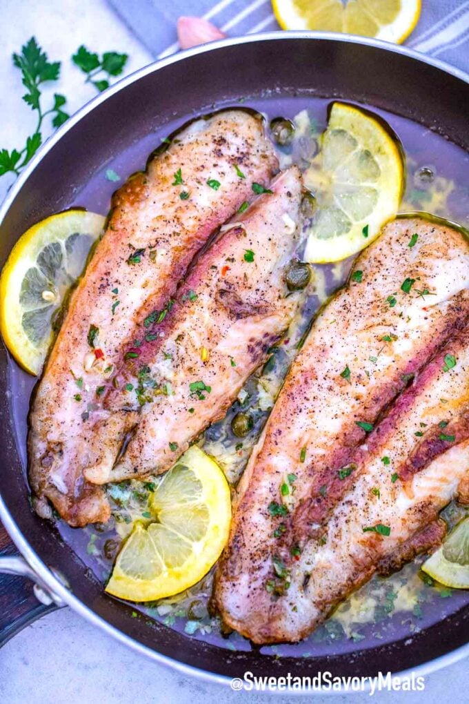 frying Swai fish in a skillet with lemon and capers