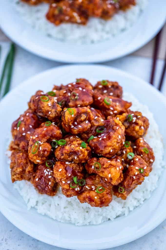 Homemade crispy Korean fried chicken over white rice.