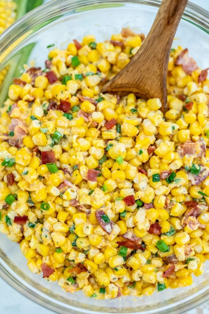 Sweet corn salad with bacon in a large bowl