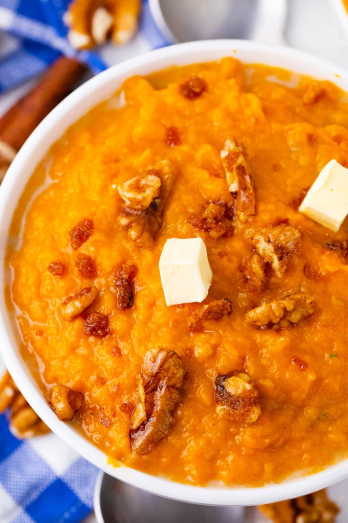 A bowl of crockpot mashed sweet potatoes.