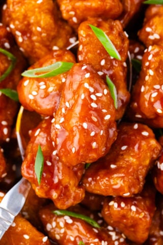 Crispy and sticky Asian honey sesame chicken.