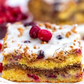 Cranberry Coffee Cake is the perfect fall dessert to partner with your favorite coffee! It is moist, sweet, and tart at the same time, and very easy to make! #coffeecake #cranberries #falldesserts #sweetandsavorymeals #thanksgiving