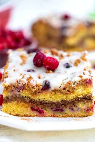 Cranberry Coffee Cake is the perfect fall dessert to partner with your favorite coffee! It is moist, sweet, and tart at the same time, and very easy to make! #coffeecake #cranberries #falldesserts #sweetandsavorymeals #thanksgiving