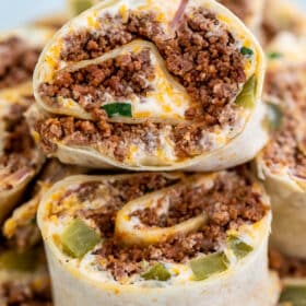Cuban Sausage Pinwheels are great for parties or lunchboxes! Serve this dish as an appetizer or simple snack that is loved by both kids and adults alike! #sausage #lunchbox #lunchideas #sweetandsavorymeals #fingerfood