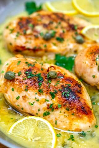 Chicken Piccata is creamy, buttery, and tangy at the same time! All the flavors combined in this savory chicken dish, make it perfect for pasta! #lemonchicken #chicken #chickenpiccata #dinnerideas #italianrecipes #sweetandsavorymeals