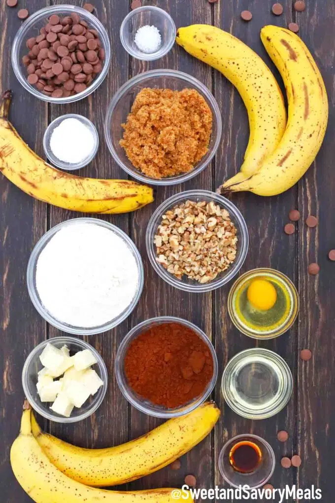 ripe bananas and ingredients in bowls on a table