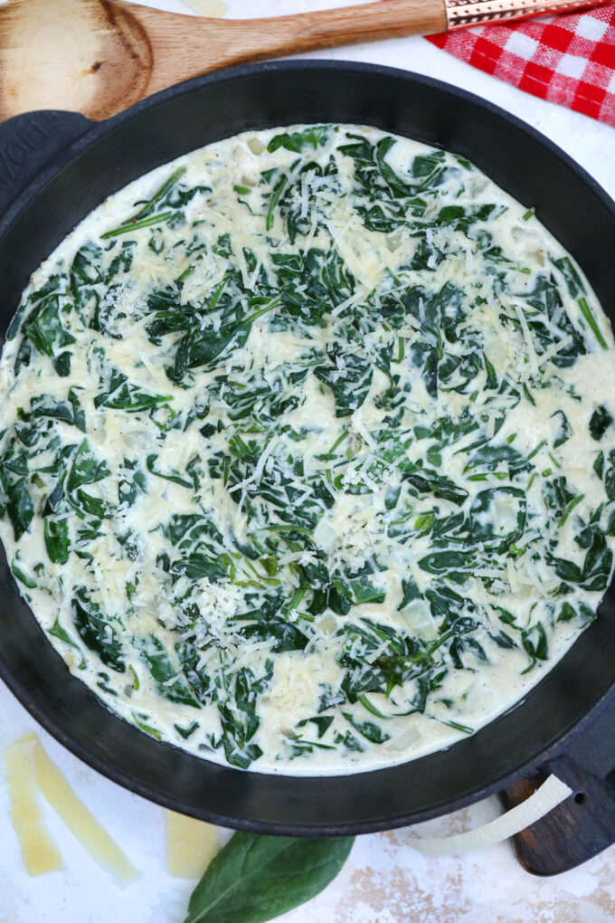 Creamed Spinach is creamy and cheesy making it a delectable side dish to savory entrees! It is a nice take on the leafy green that even kids will love! #spinach #creamedspinach #sidedish #thanksgiving #sweetandsavorymeals