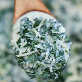 Creamed Spinach is creamy and cheesy making it a delectable side dish to savory entrees! It is a nice take on the leafy green that even kids will love! #spinach #creamedspinach #sidedish #thanksgiving #sweetandsavorymeals