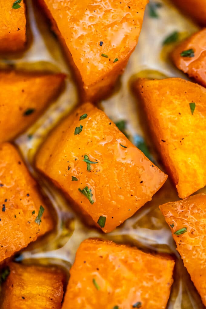 cubed roasted sweet potatoes on a baking sheet