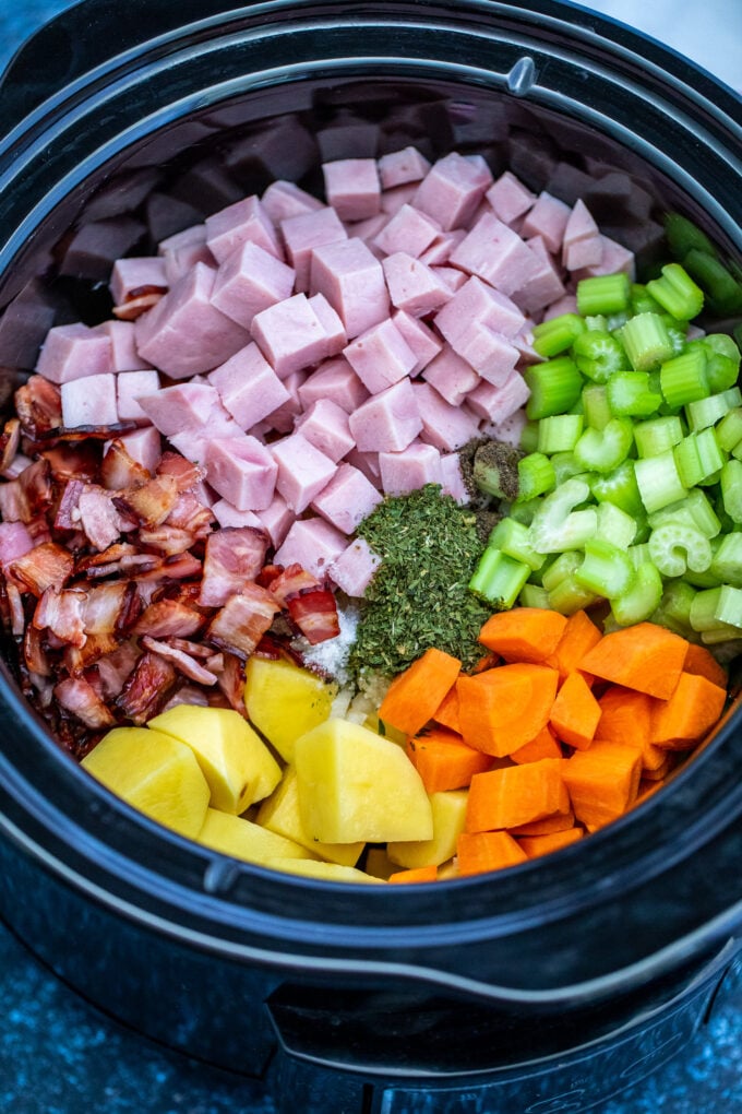 Ingredients for ham and potato soup chopped together and put in the crockpot